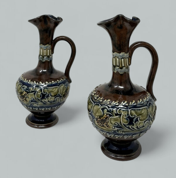 128. Antique Pair English Porcelain Royal Doulton Art Nouveau Ewers Pitchers Urns